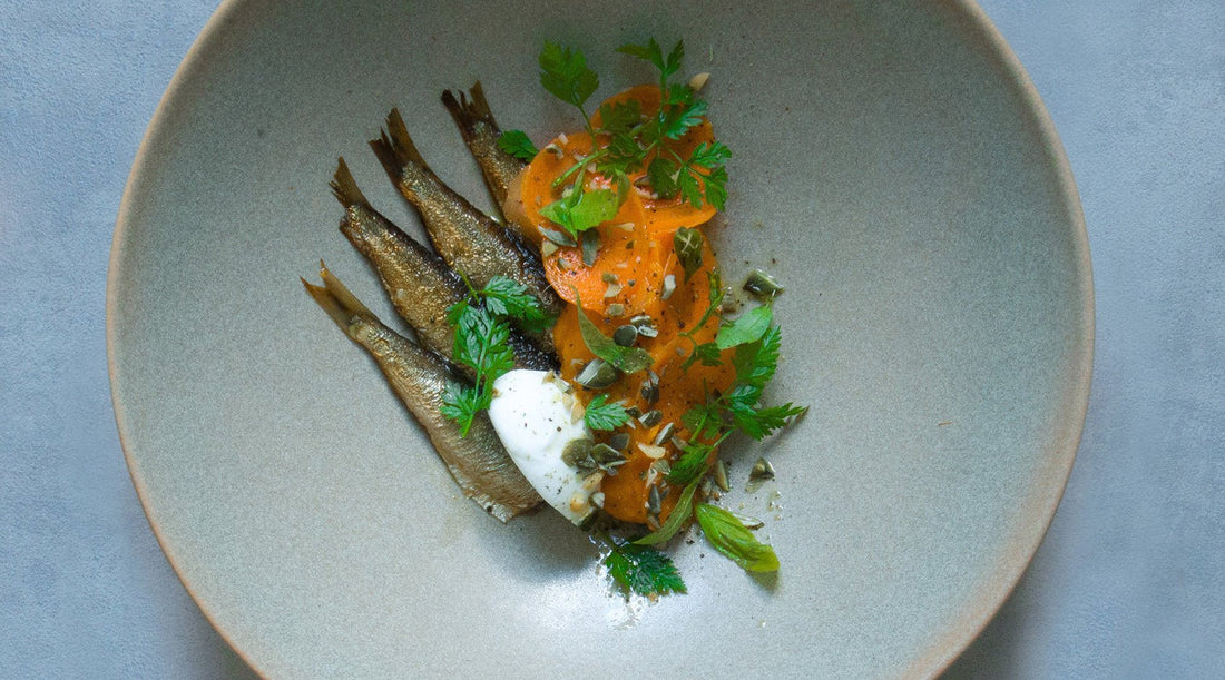 Fangst Nordic sardine with pumpkin purée, pickled carrot, yoghurt and crispy pumpkin seeds